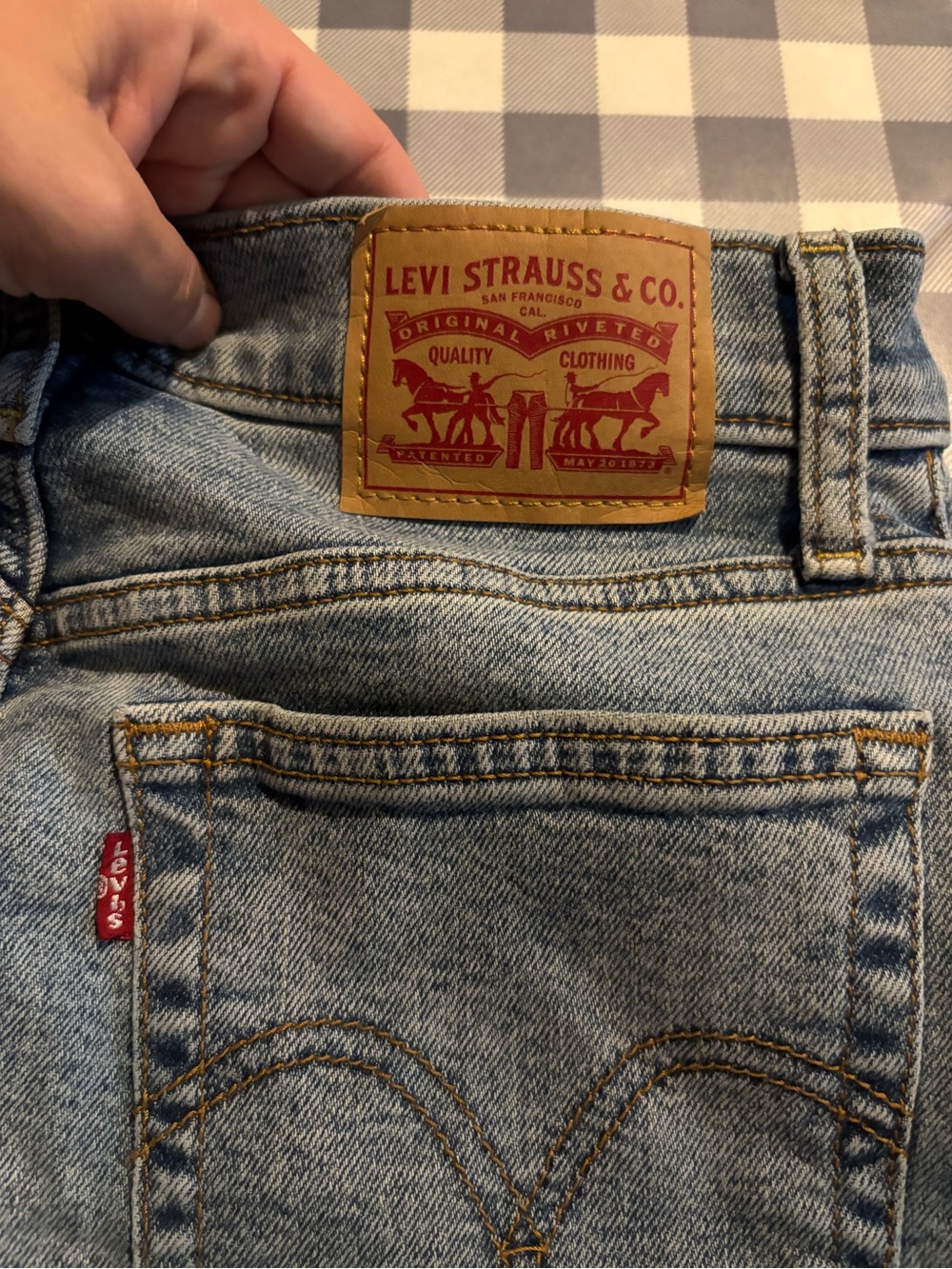 Levi's Light Blue Denim Jeans with Tan Leather Patch